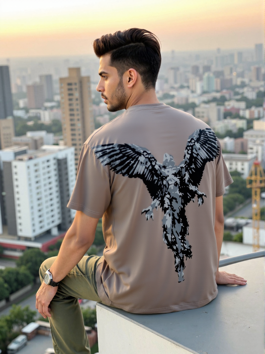 A man wearing oversized t-shirt