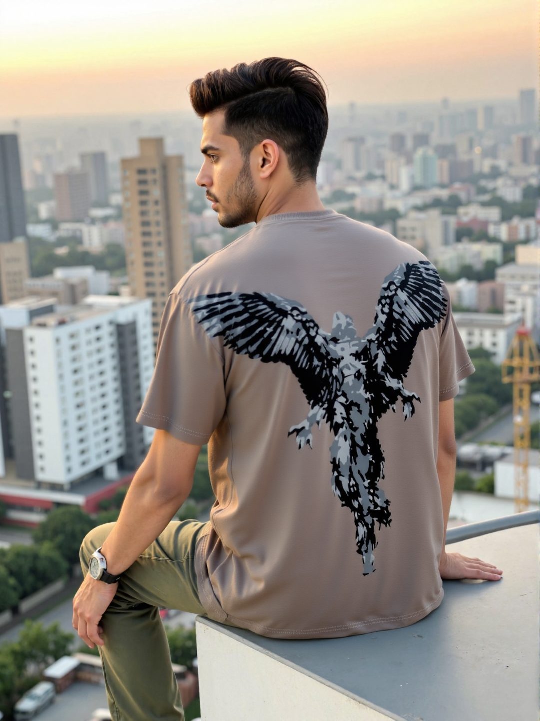 A man wearing oversized t-shirt